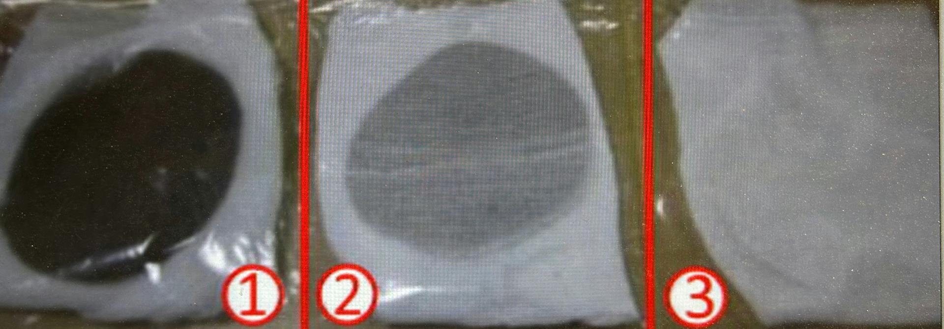 Examples of soot particle tests one and two: soot readily visible. Three: no soot.