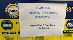Conrads-COVID-distancing-sign