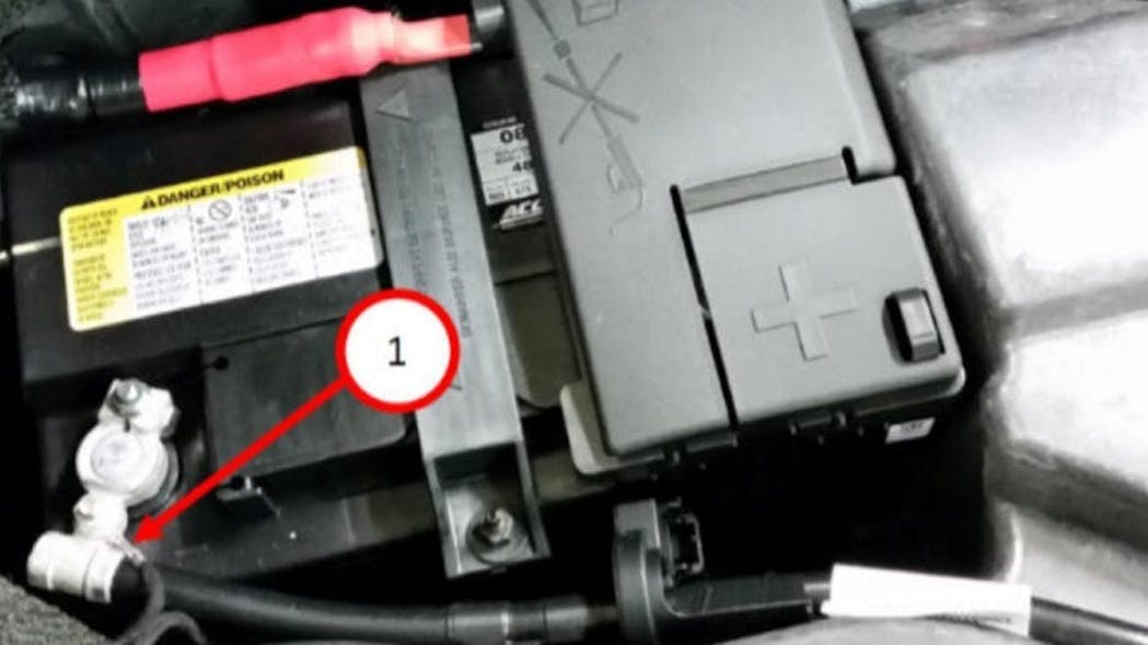 Inspect the small black wire at the battery negative connection.