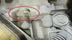 Example of an oil leak at the transmission case seam.