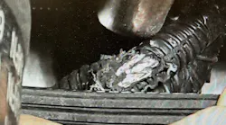 Example of damaged wiring harness caused by belt contact.