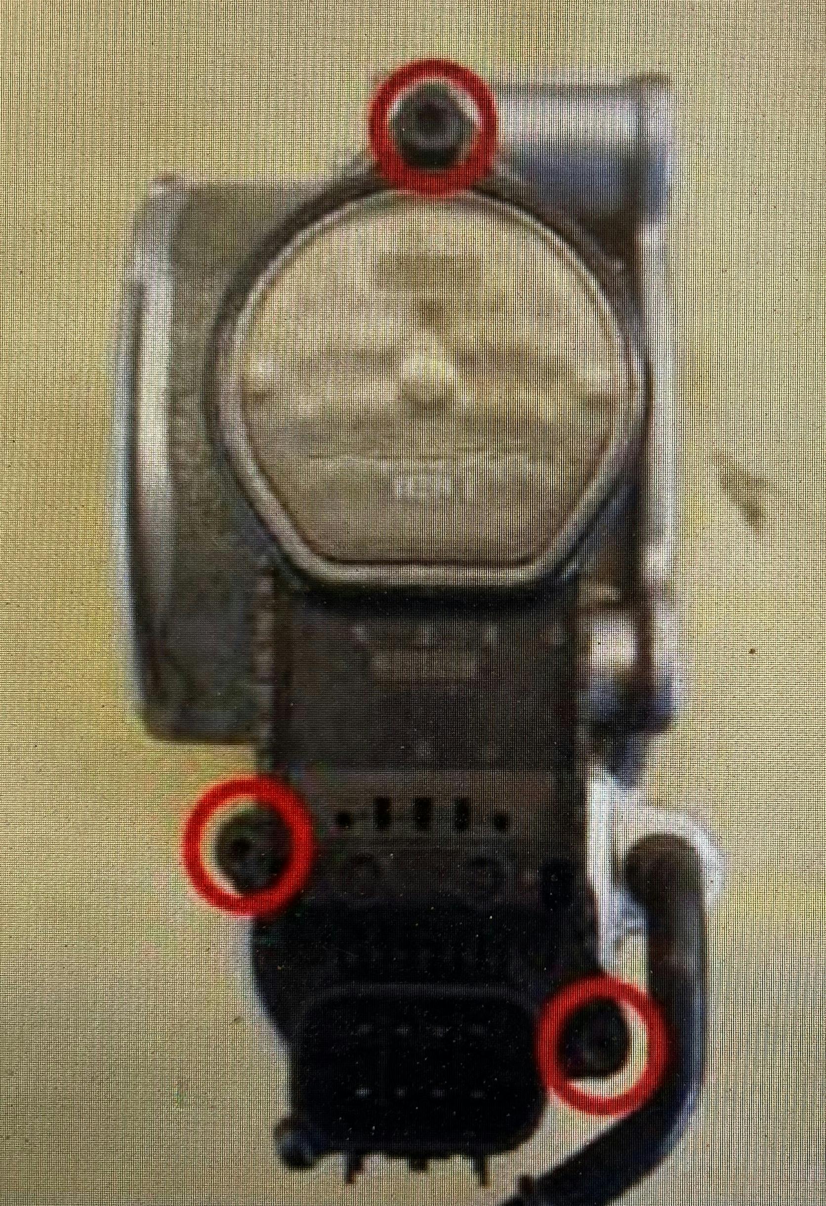 Note the location of the three T-20 screws on an electric throttle control.