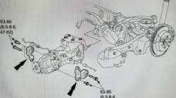 Note the location of the rear differential mounting rubbers. Torque the mounting screws to 47- 62 ft.-lb.