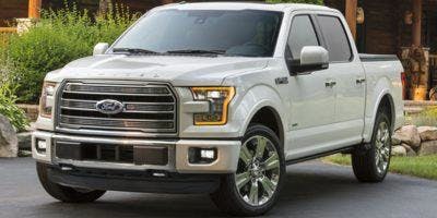Replace the front bumper trim panel on F-150 vehicles or the cruise control module (CCM) cover on F-Super Duty vehicles. It is not necessary to remove the CCM itself.
