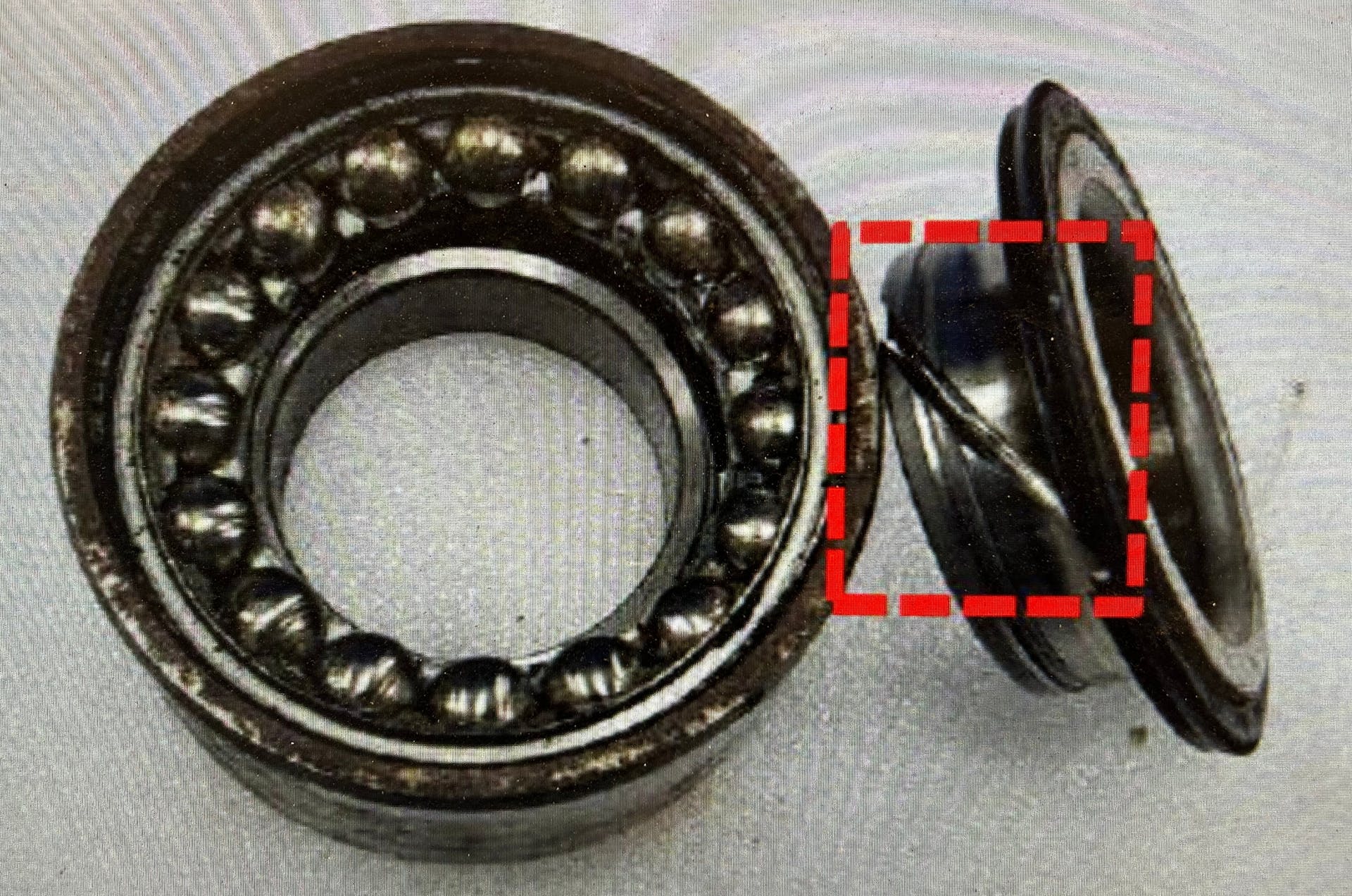 Example of splitting/cutting of the inner wheel bearing race due to improper tool/method of bearing removal or installation.