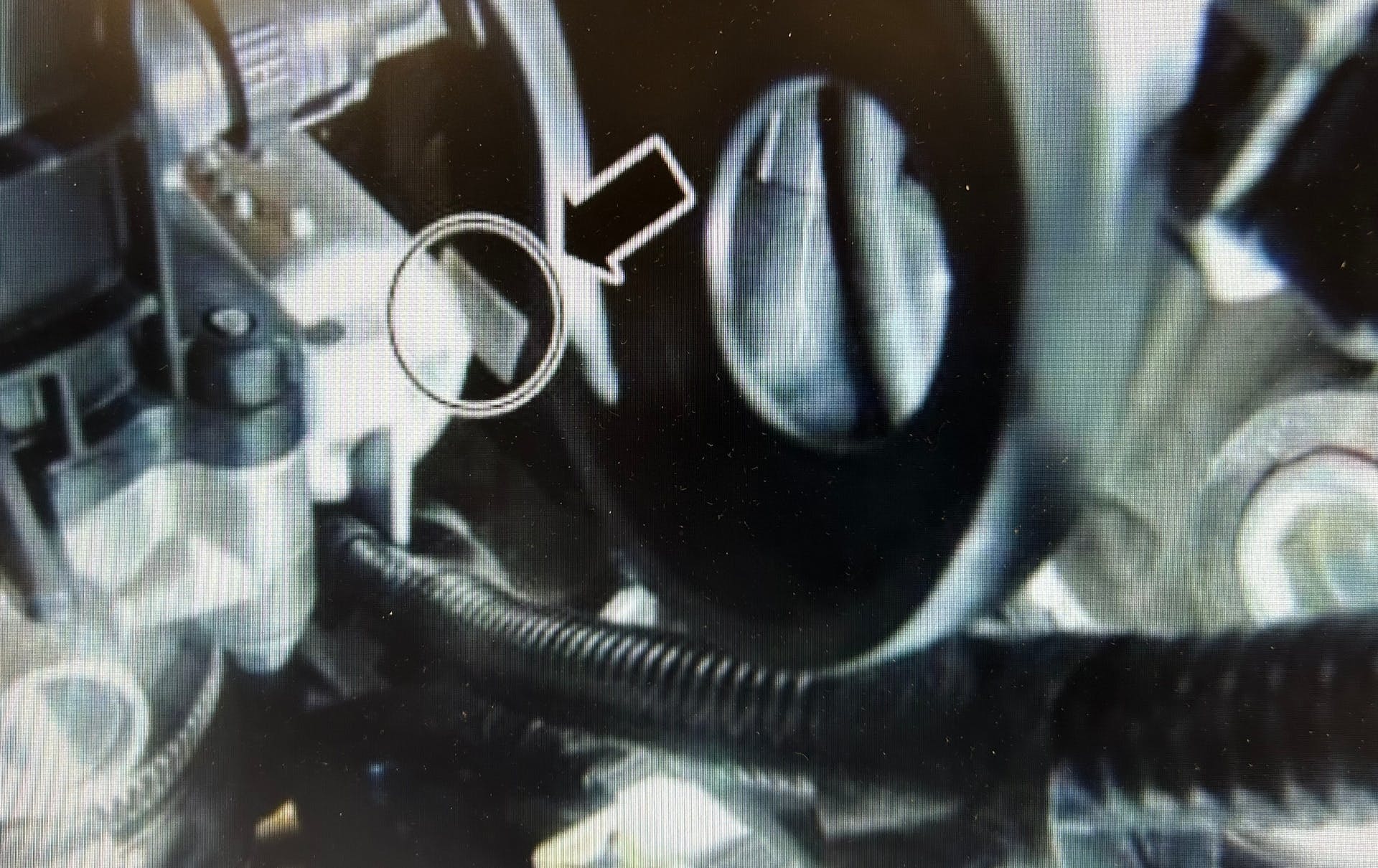 The tag can be seen to the right of the throttle body.