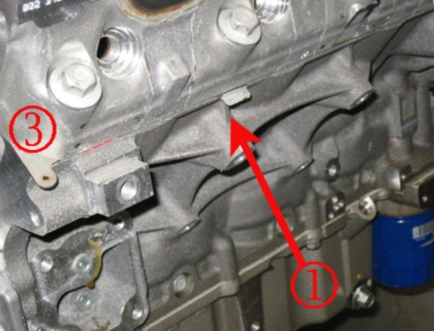 Example of the left side. The tab near the center (1) should be biased towards the front and the locating tab (3) should be at the front. This applies to both right and left engine sides.