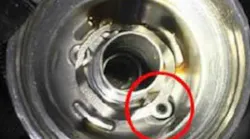 An improved rubber plug and spring is available for the oil filter housing.