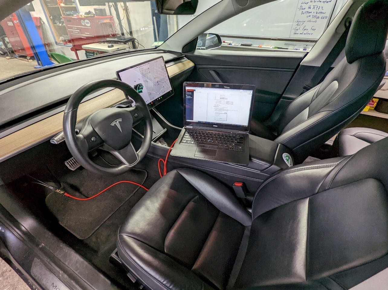 A laptop, cable and Tesla web access add up to: a scan tool.