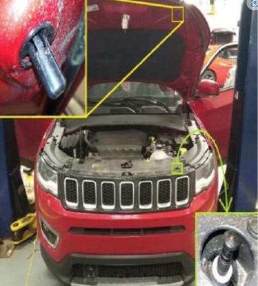Remove the original striker plate from the hood.