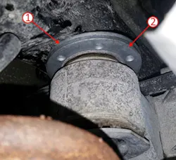 Example of added shim (1) over the differential mount washer (2),