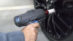 Figure 1 &ndash; The Matco Tools impact wrench being used along with the Sunex Custom Wheels Socket.