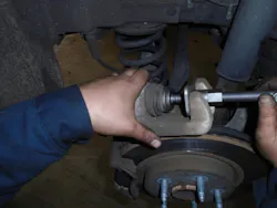 Figure 7 – This shows how the Orion Motor Tech Tools caliper retraction tool fits into the grooves on the rear caliper piston, allowing for easy piston retraction.