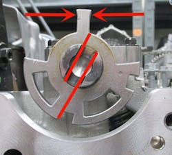 Verify that the small tang on the exhaust cam reluctor ring is in line with the 2D matric mark.