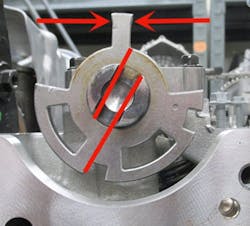 Verify that the small tang on the exhaust cam reluctor ring is in line with the 2D matric mark. Verify that the small tang on the exhaust cam reluctor ring is in line with the 2D matric mark.