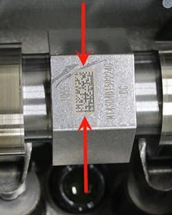 Rotate the exhaust camshaft to position the 2D matric marking on the cam hex in the 12 o'clock position. Rotate the exhaust camshaft to position the 2D matric marking on the cam hex in the 12 o'clock position.