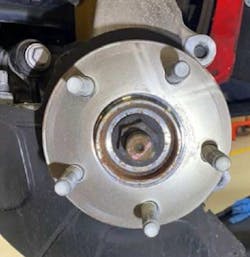 Install the friction disc to both front hub flanges. Install the friction disc to both front hub flanges.