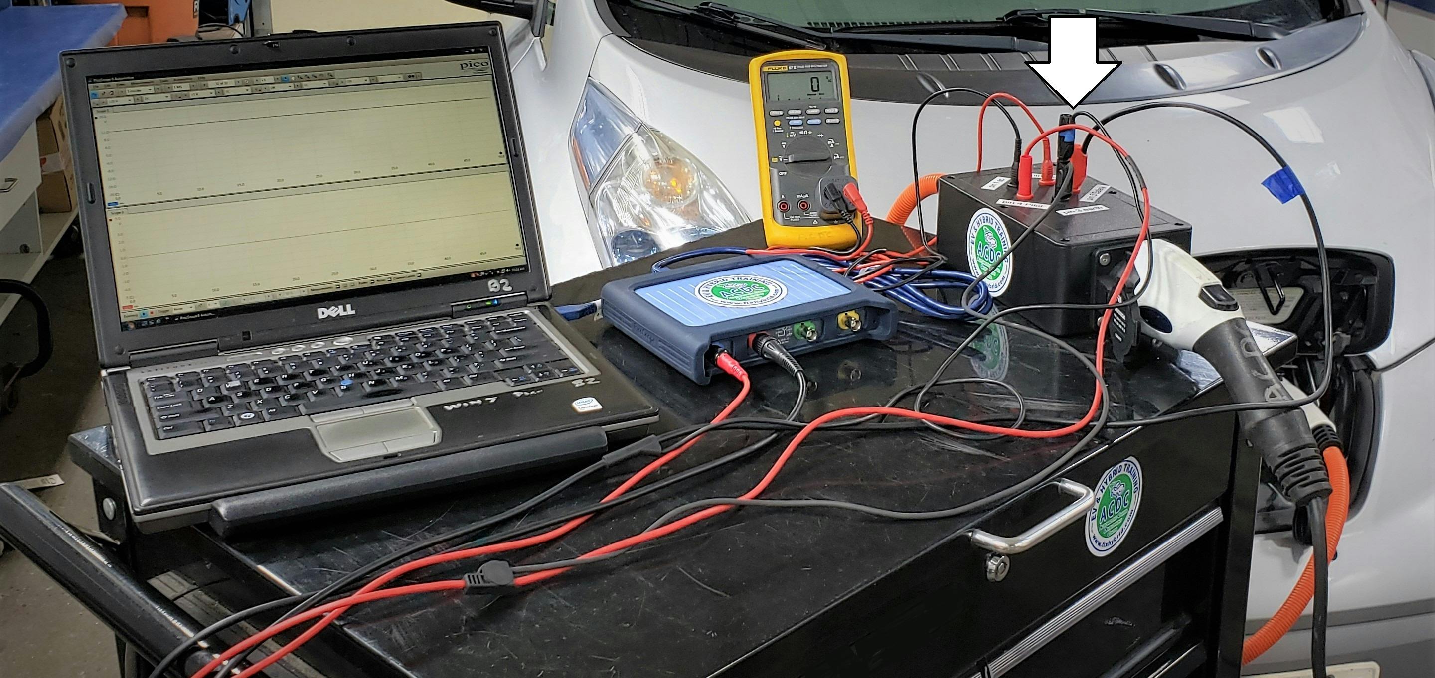 This breakout box (see arrow in upper right corner) helps in fixing a grid charging issue.