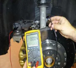Use an ohmmeter to check that all of the newly attached ground cables are working (zero resistance between the wheel hub and vehicle ground). You may now install the new DSC control unit. Use an ohmmeter to check that all of the newly attached ground cables are working (zero resistance between the wheel hub and vehicle ground). You may now install the new DSC control unit.