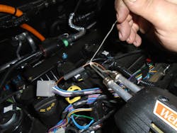 Figure 2 — This shows the solder starting to melt and flow over the wire. Figure 2 — This shows the solder starting to melt and flow over the wire.