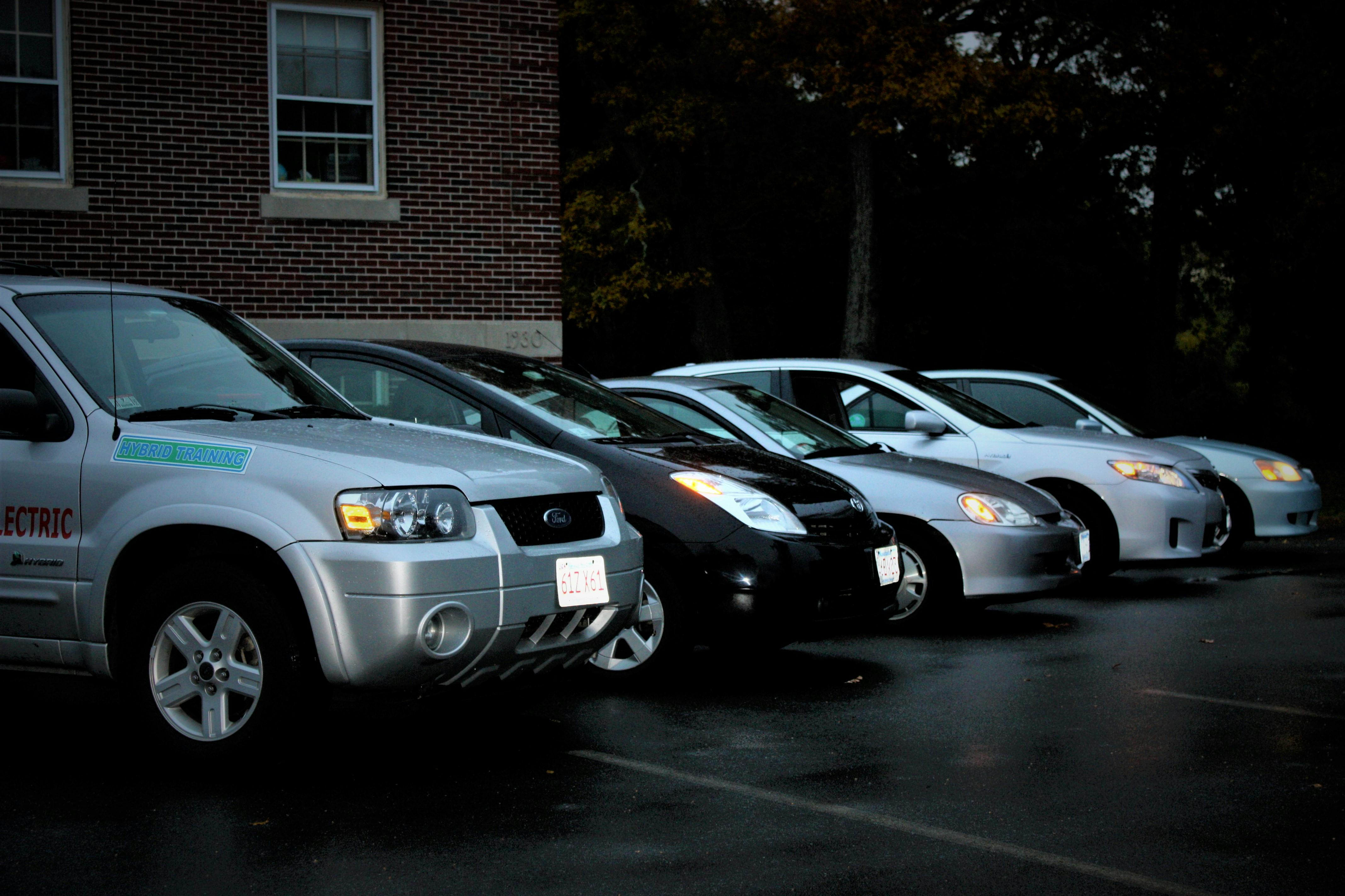 Figure 2 - The five HEVs for sale in 2005. Honda Insight shown at center.
