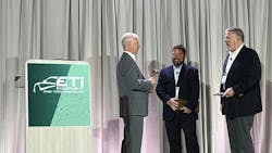 Previous ETI President David Rich (middle) handing off the gavel to the current ETI President Bob Augustine (left). Previous ETI President David Rich (middle) handing off the gavel to the current ETI President Bob Augustine (left).