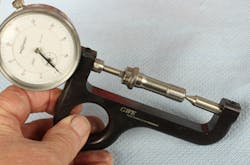 If you wish to monitor rod bolt stretch, the rod bolt is first placed onto the stretch gauge in its relaxed state, and the dial indicator is set at zero. This provides a base reference of bolt length. If you wish to monitor rod bolt stretch, the rod bolt is first placed onto the stretch gauge in its relaxed state, and the dial indicator is set at zero. This provides a base reference of bolt length.