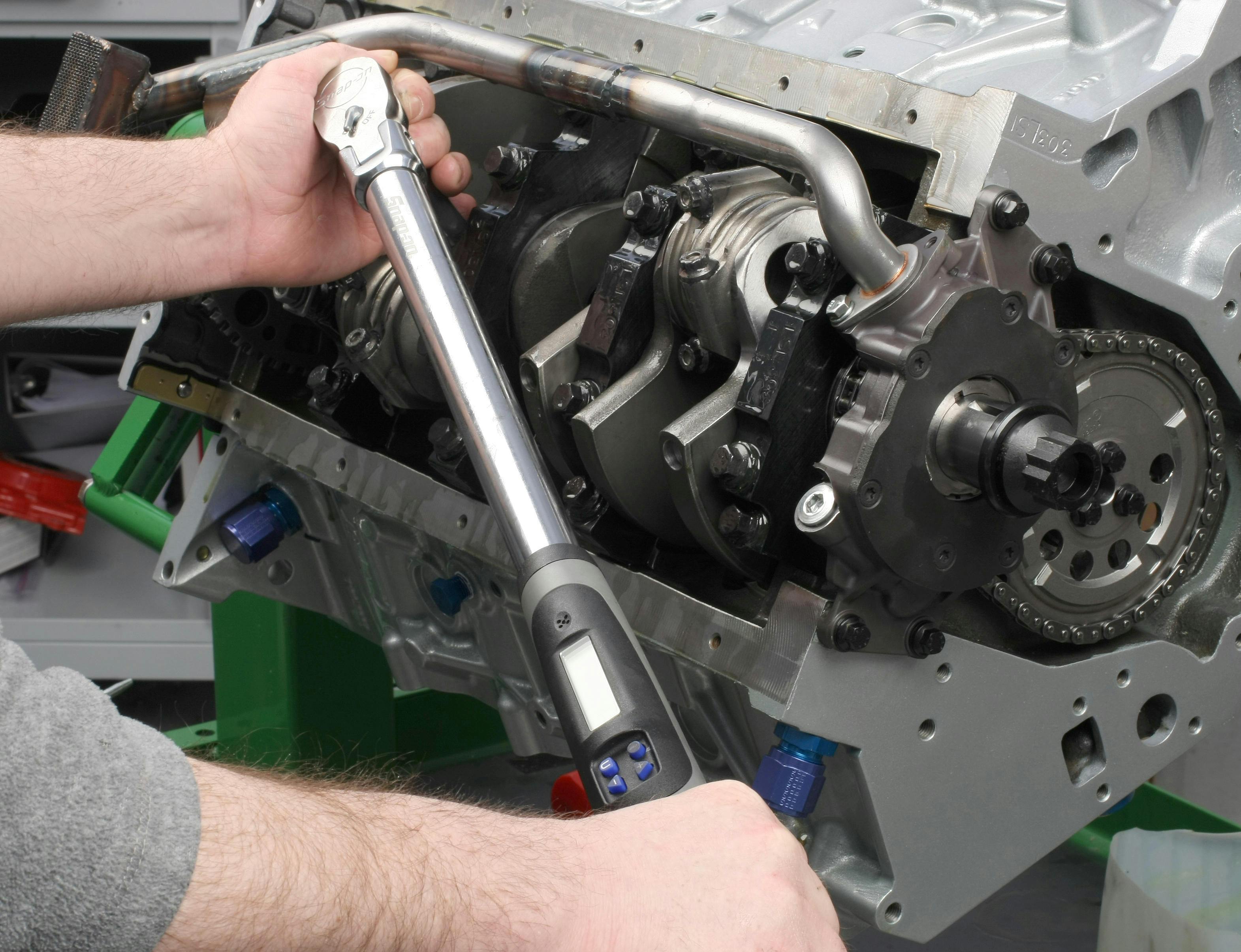 When tightening with a torque wrench, avoid quick/jerky movements. Use a steady, smooth pull and support the drive head to help keep the socket wrench engagement straight and in line with the fastener.