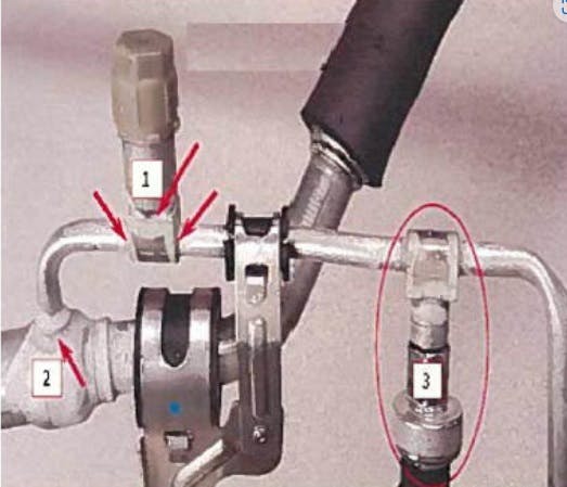 Example of leak locations. 1)charge port; 2) internal heat exchanger; 3_ pressure transducer port.