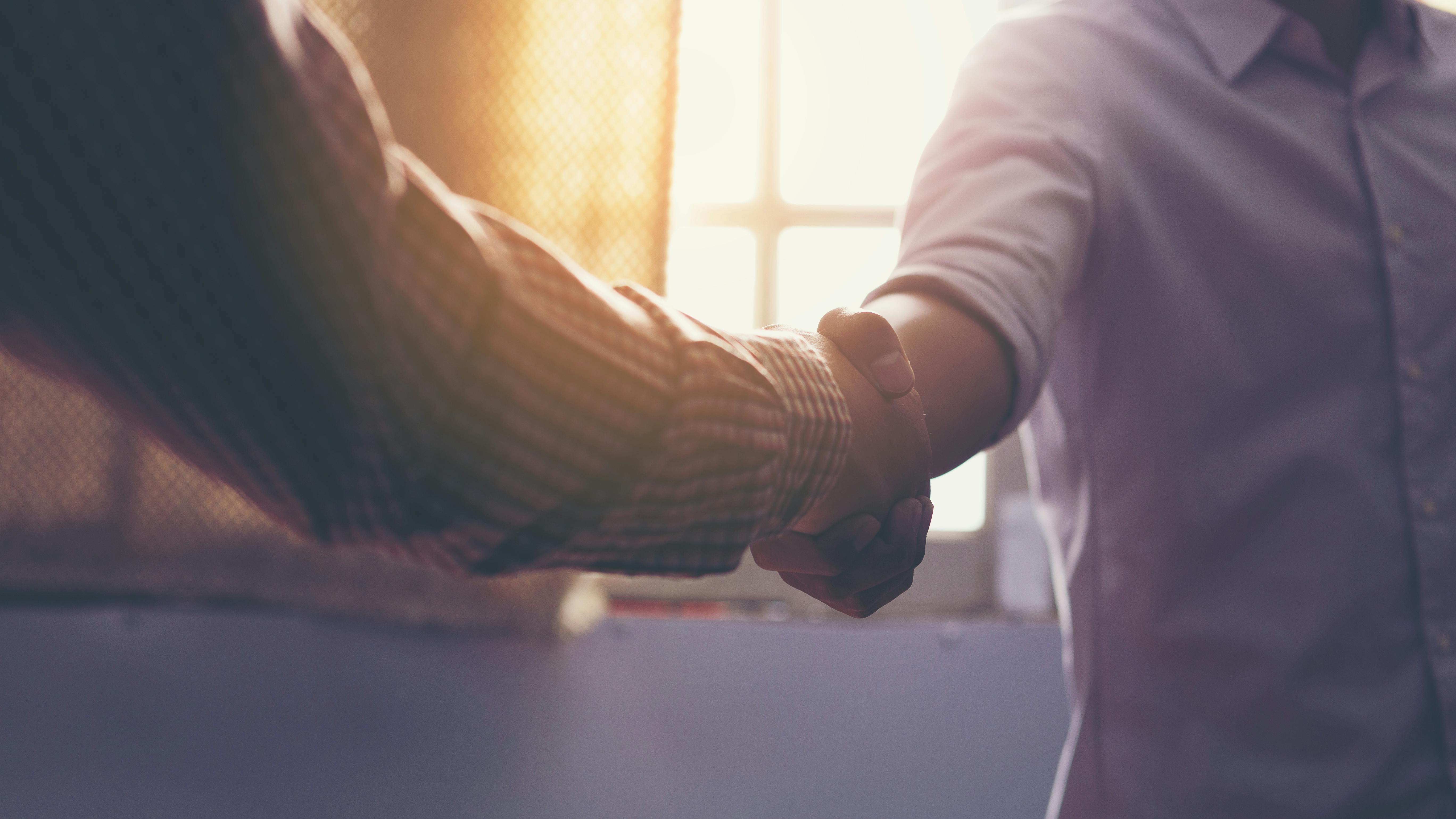 men shaking hands