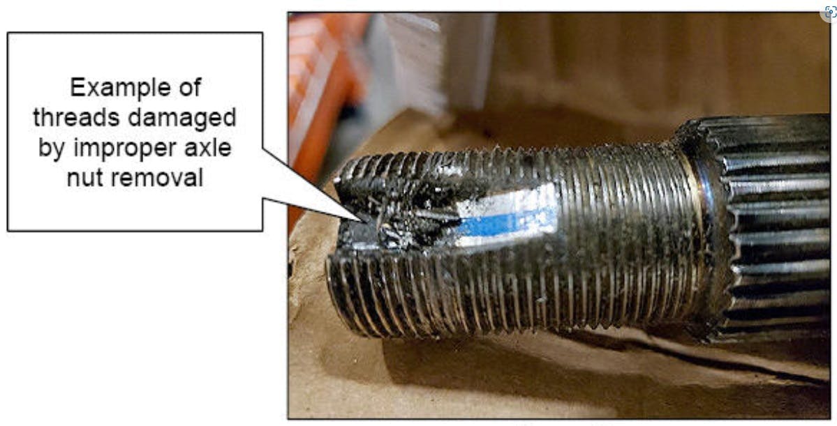 Example of axle threads that were damaged by improper nut removal.