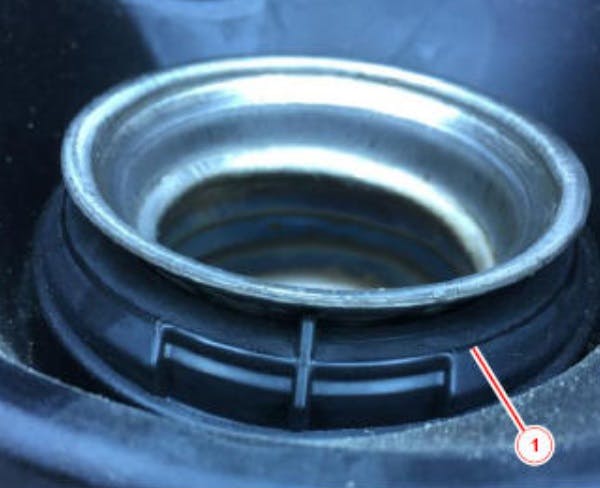 Example of a no-good condition where the cap was contacting the neck (1).