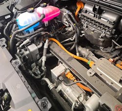 With the trim panels removed you can see all the extra plumbing involved in this heat pump equipped 2023 Hyundai IONIQ 6, this illustrates the need to follow the diagnostics to remove or service the A/C system. With the trim panels removed you can see all the extra plumbing involved in this heat pump equipped 2023 Hyundai IONIQ 6, this illustrates the need to follow the diagnostics to remove or service the A/C system.