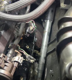 Figure 5: This is fuel shooting out of cylinder #5 as the engine is being turned over by hand. Figure 5: This is fuel shooting out of cylinder #5 as the engine is being turned over by hand.