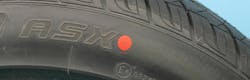 The red dot on a tire indicates the tire’s high/stiff point in terms of radial runout. If the tire features both a red dot and a yellow dot, the red dot should be the priority. The red dot on a tire indicates the tire’s high/stiff point in terms of radial runout. If the tire features both a red dot and a yellow dot, the red dot should be the priority.