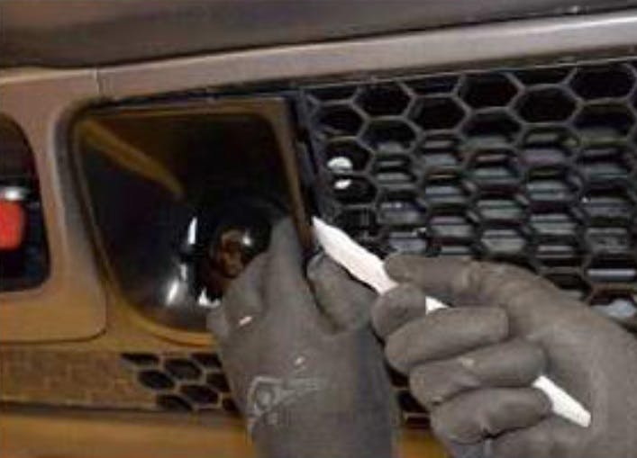 There's no need to remove the entire front fascia. Only remove the ACC fascia bezel as seen here. Use a plastic trim tool.