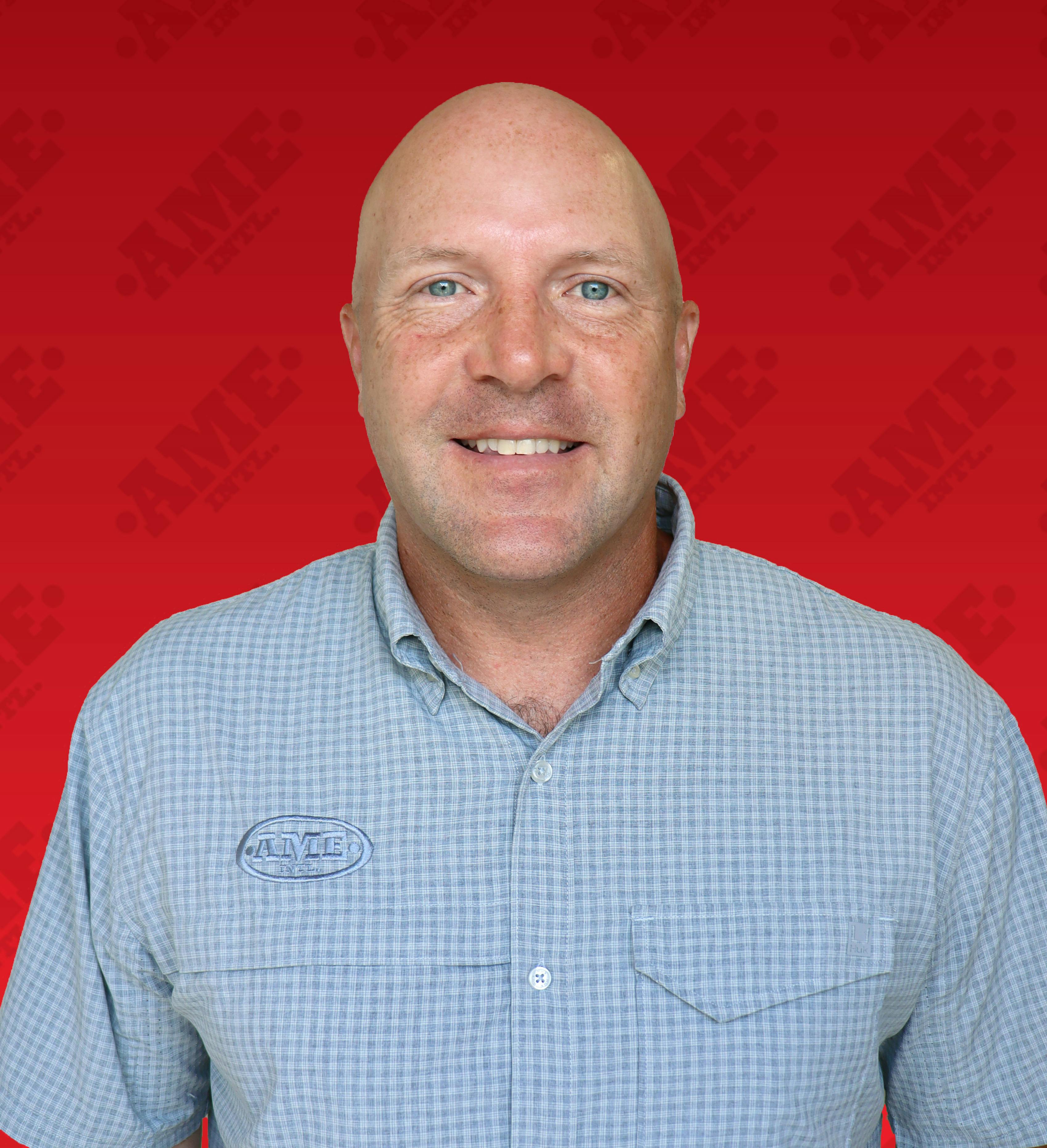 don_tinker_headshot_casual_ame_titled_background