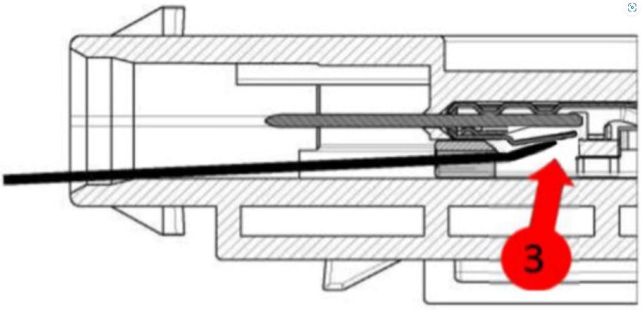 Once the release tab is pushed in, pull the wire and terminal out of the rear of the connector body. Once the release tab is pushed in, pull the wire and terminal out of the rear of the connector body.