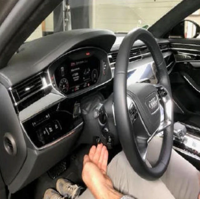 Push the steering wheel up using about 88 lbs., of force.