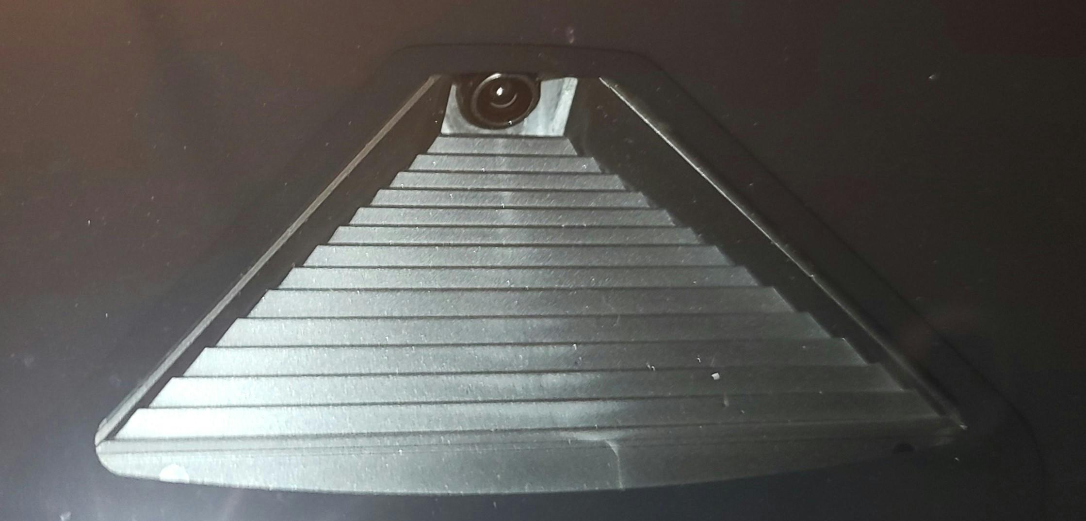 You can clearly see the forward-facing camera, mounted above the rearview mirror on this 2023 Honda Pilot.