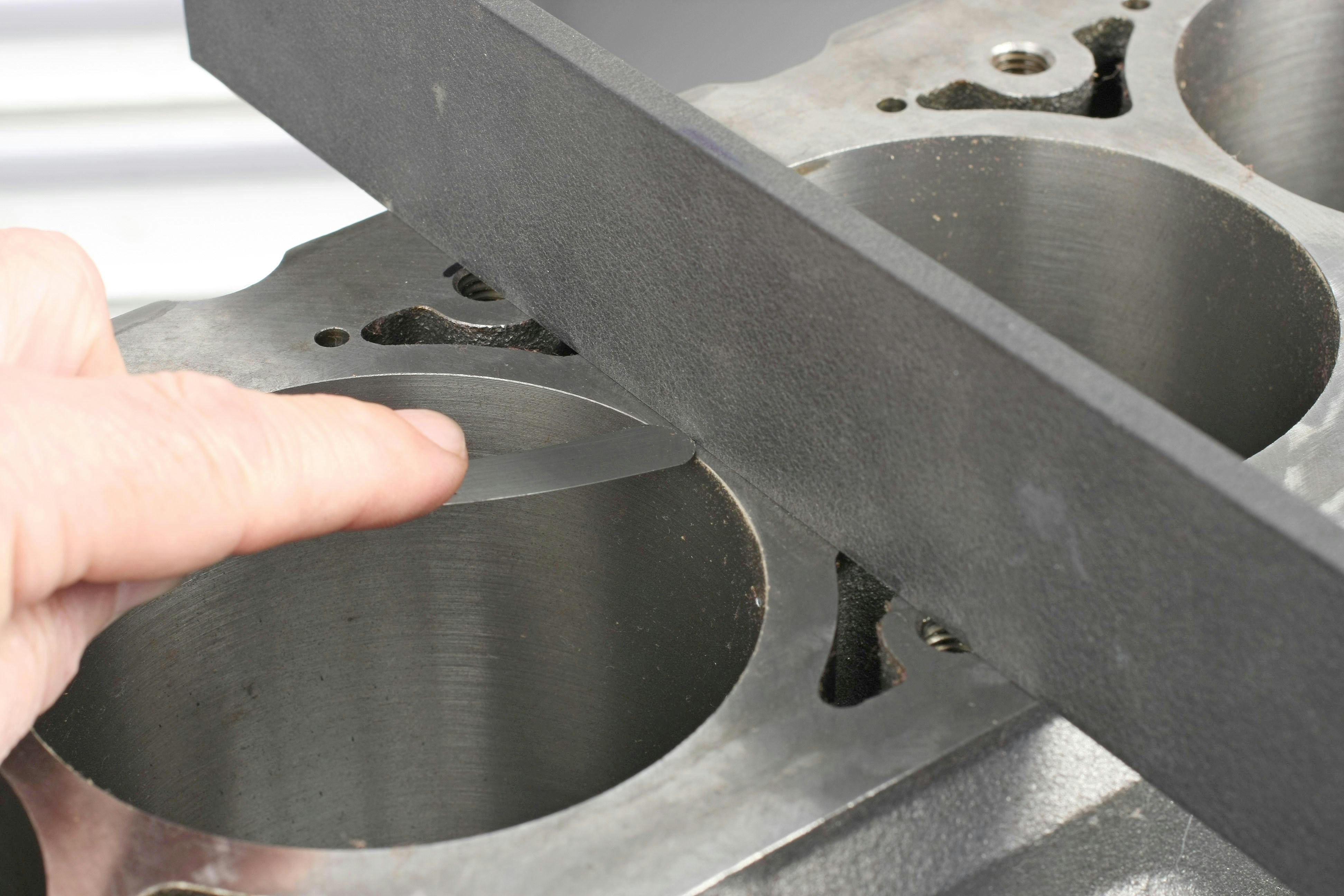 Check inboard-to-outboard deck flatness (intake to exhaust sides).