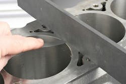 Check inboard-to-outboard deck flatness (intake to exhaust sides). Check inboard-to-outboard deck flatness (intake to exhaust sides).