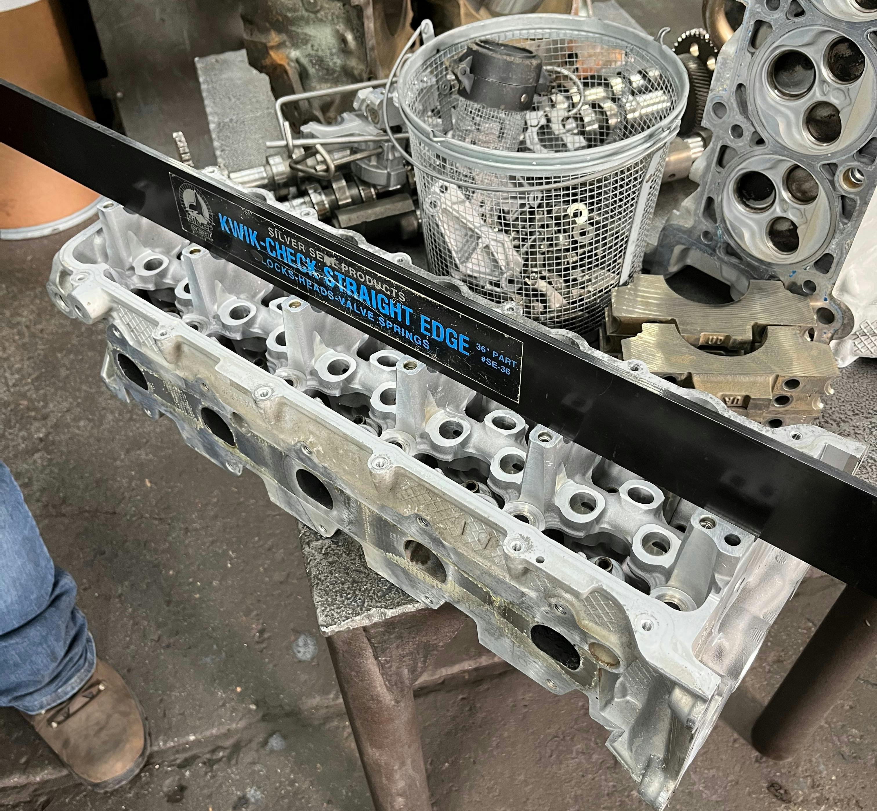 Overhead cam bores can be checked for straightness/alignment using a precision straightedge or precision-ground rod.