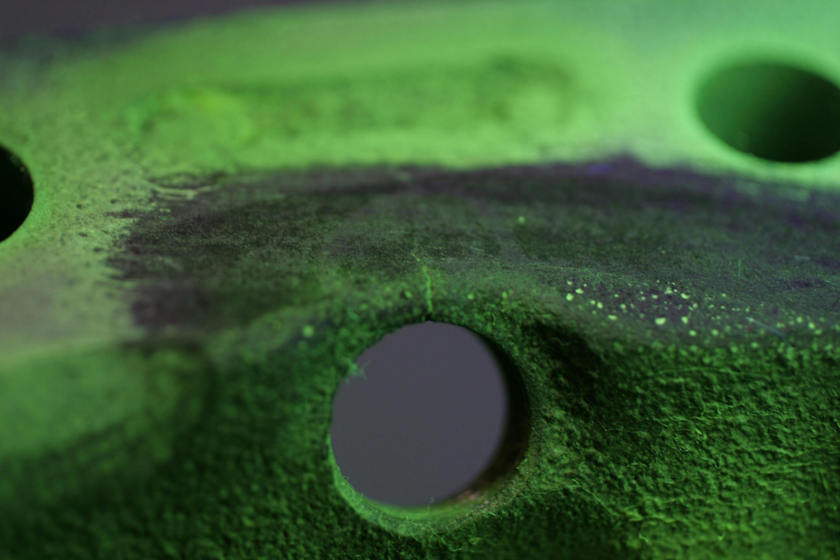 Notice the small crack. This would not have been visible without use of the dye and black light.