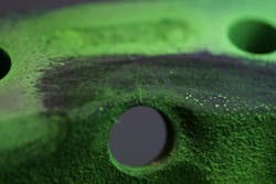 Notice the small crack. This would not have been visible without use of the dye and black light. Notice the small crack. This would not have been visible without use of the dye and black light.