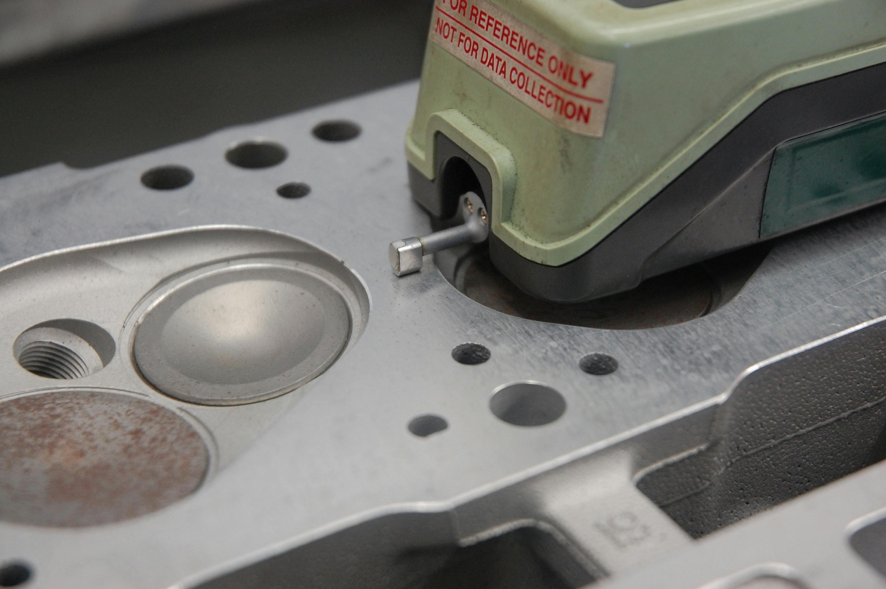 A motorized stylus slowly moves across the surface, providing an accurate RA reading. Surface finish is critical. Depending on the head (iron or aluminum), and the type of head gasket (composite or MLS/multi-layer steel), a specific range of RA finish is required.
