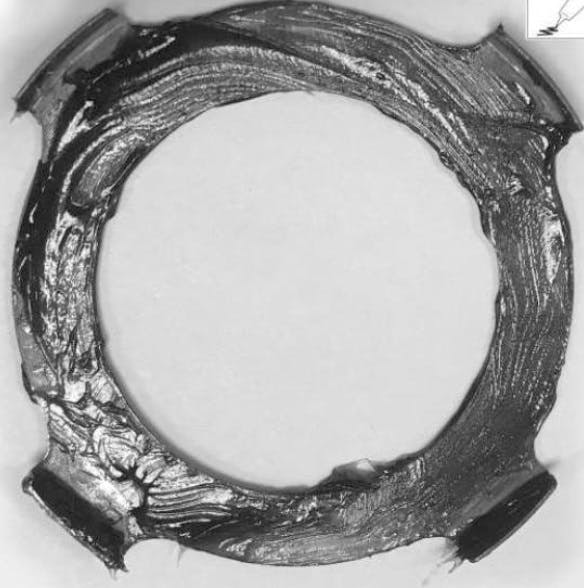 Apply a light coat of grease to both sides of the anti-ting washer.