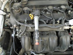 Figure 1 shows the tester attached to coil #2 and the ground wire attached to a good engine ground. Figure 1 shows the tester attached to coil #2 and the ground wire attached to a good engine ground.