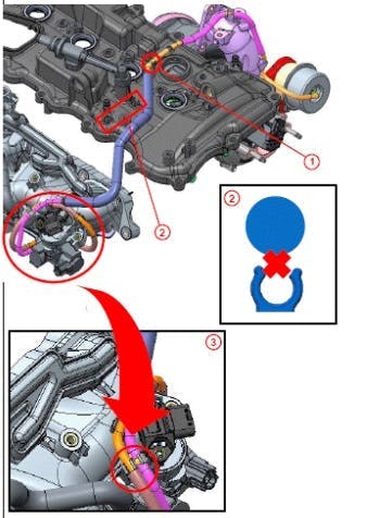 Example of the new hose routing. 1) No. 1 vacuum transmitting hose clamped to the cylinder head cover at one point; 2) The hose does not clamp to this point on the cylinder head cover; 3) Additional clamp point where the vacuum hose is secured to an adjacent hose with a hose clamp.