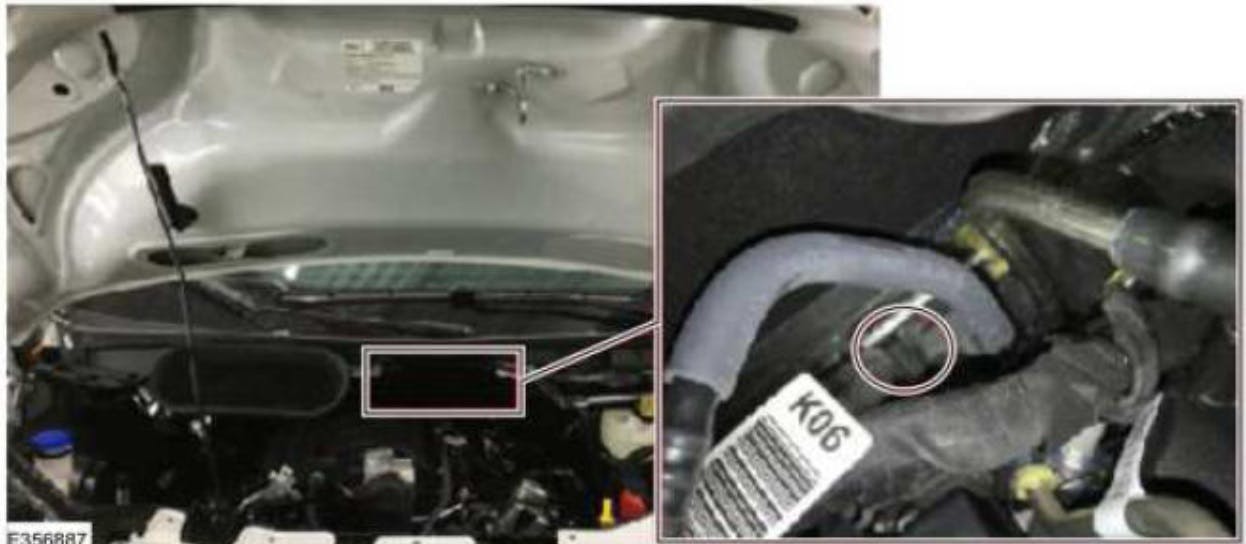 Ther tube install area is at the center rear of the engine bay.